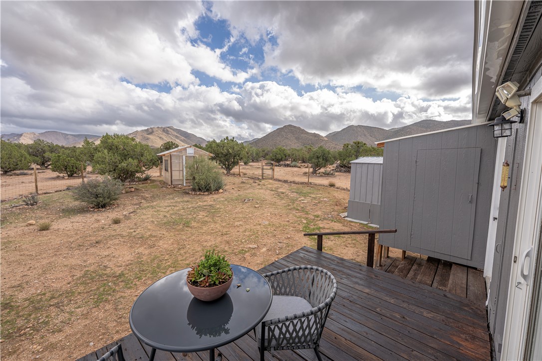2765 North Silver Springs Road Kingman, AZ 86401 - Photo 51 of 60 a view of a terrace with furniture and a table