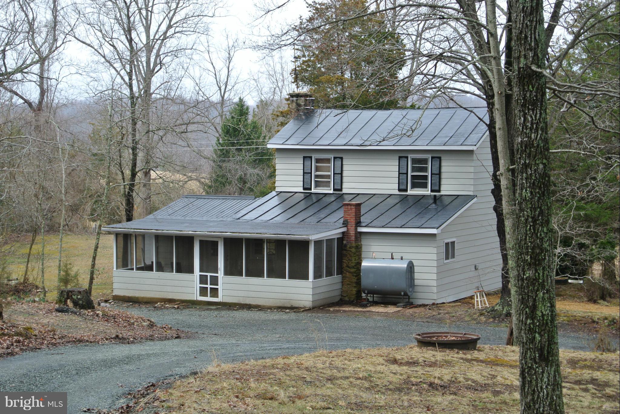 6667 Carters Run Road Marshall, VA 20115 - Photo 5 of 9 a front view of a house with a yard