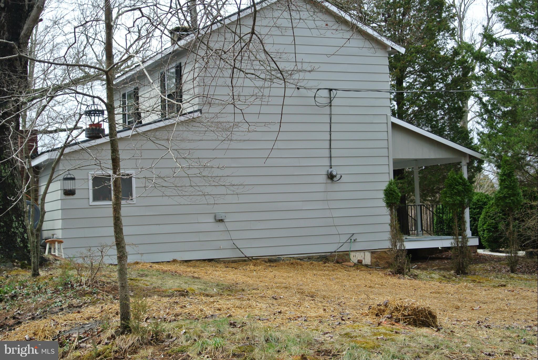6667 Carters Run Road Marshall, VA 20115 - Photo 6 of 9 a view of a house with a yard