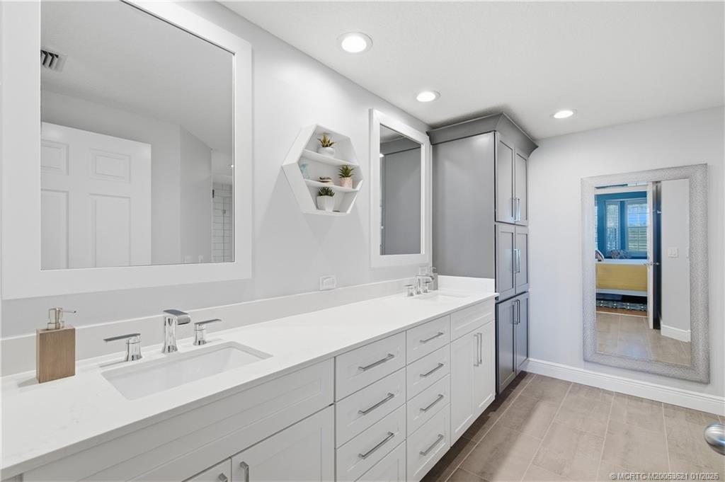 391 Northeast Plantation Road, Unit 215 Stuart, FL 34996 - Photo 18 of 40 Fully-updated Primary Bathroom