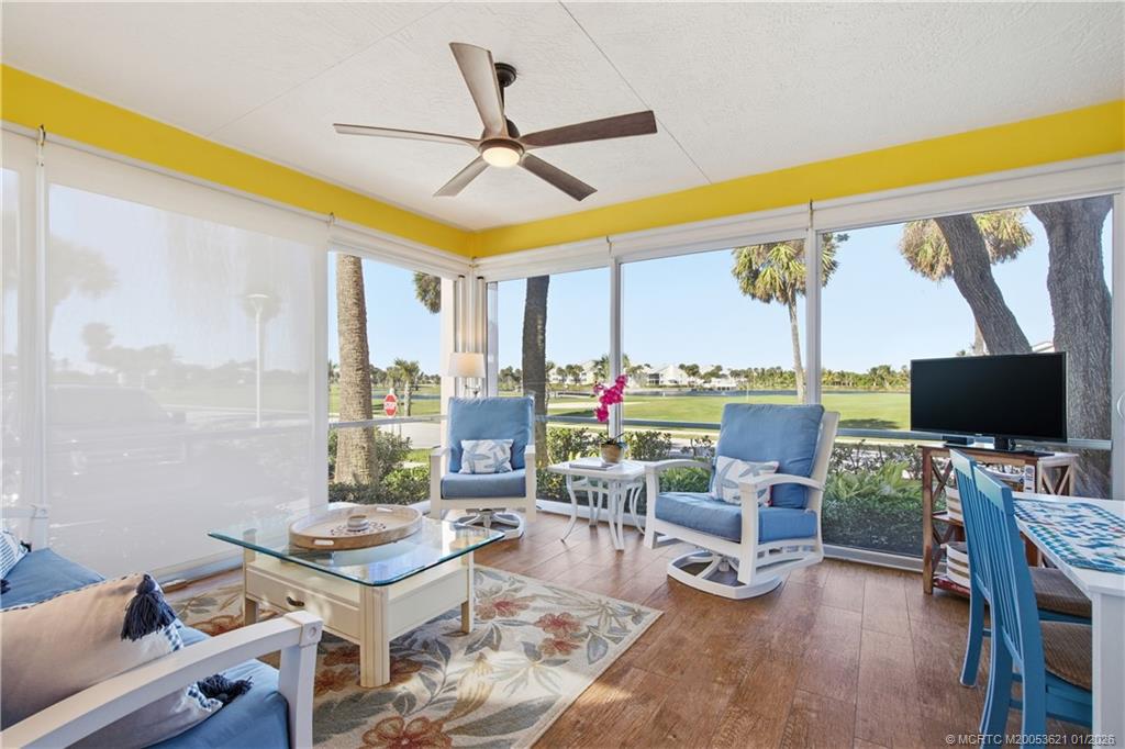 391 Northeast Plantation Road, Unit 215 Stuart, FL 34996 - Photo 26 of 40 Florida Room overlooking the 10th hole