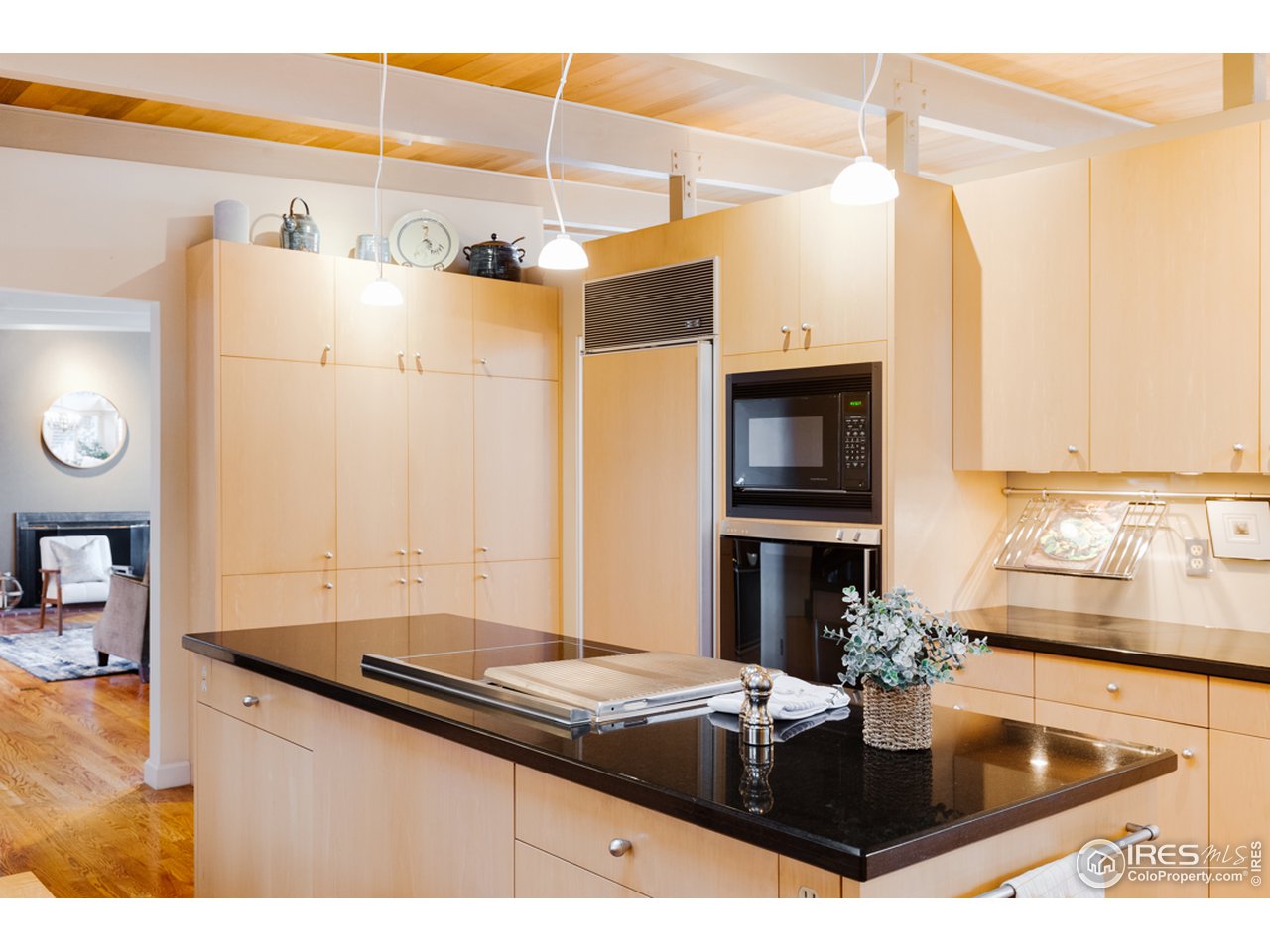 985 7th Street Boulder, CO 80302 - Photo 12 of 39 a kitchen with a sink a stove and cabinets