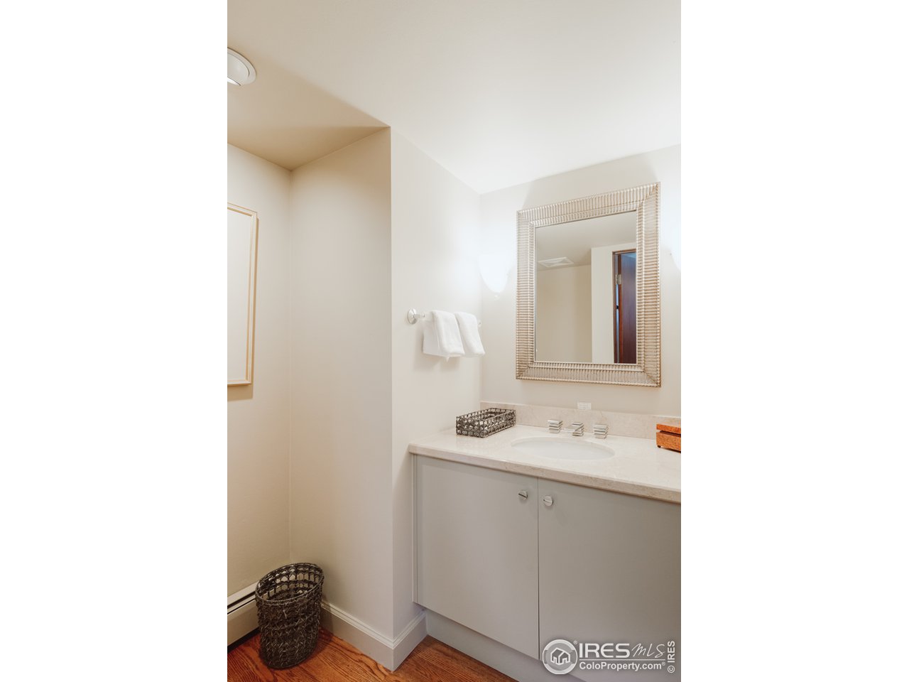 985 7th Street Boulder, CO 80302 - Photo 13 of 39 a bathroom with a sink and a mirror