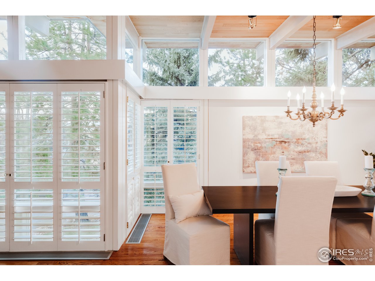 985 7th Street Boulder, CO 80302 - Photo 14 of 39 a view of a dining room with furniture window and outside view
