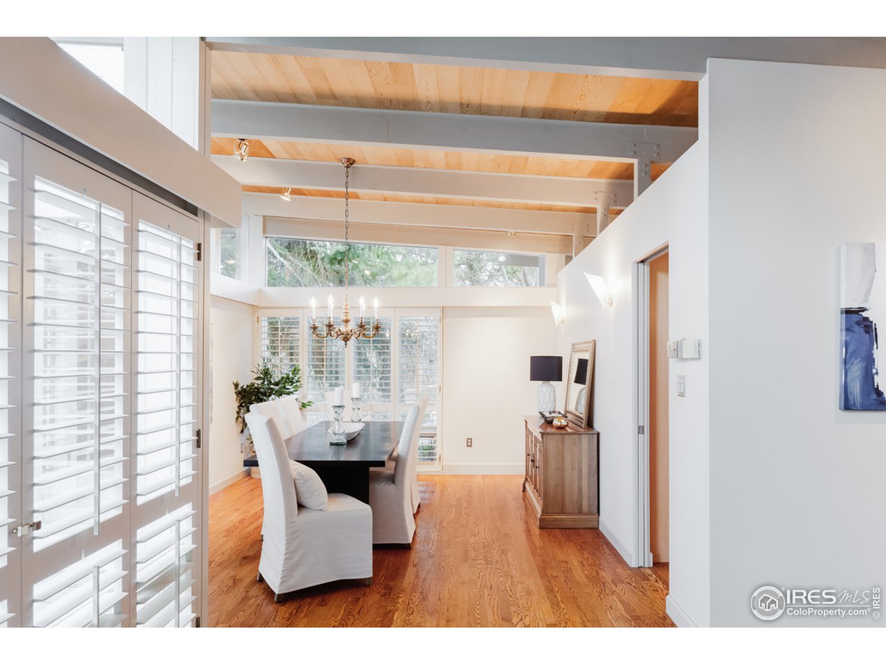 985 7th Street Boulder, CO 80302 - Photo 15 of 39 a hallway with furniture and a large window