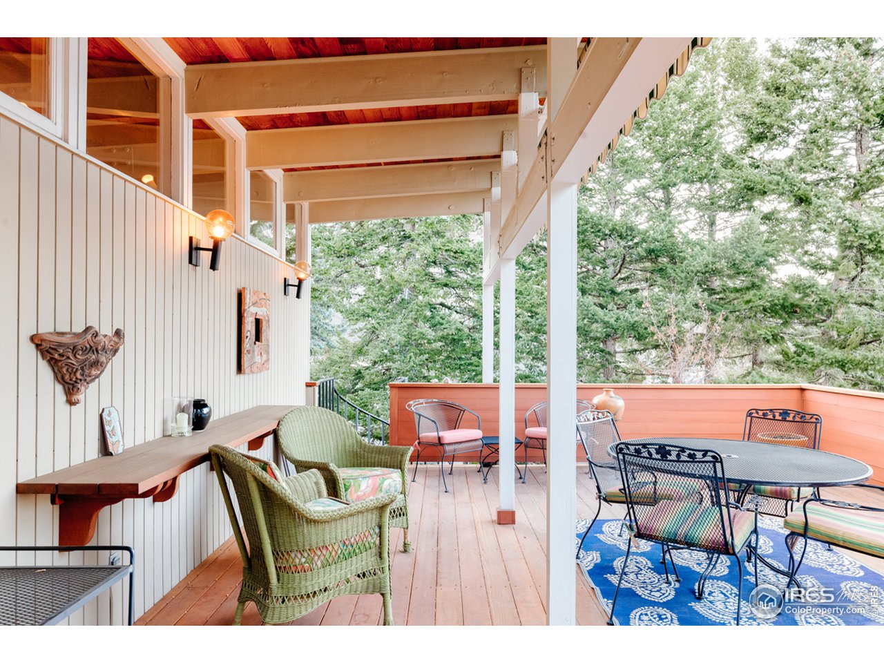 985 7th Street Boulder, CO 80302 - Photo 16 of 39 a balcony view with couple of chairs and wooden floor