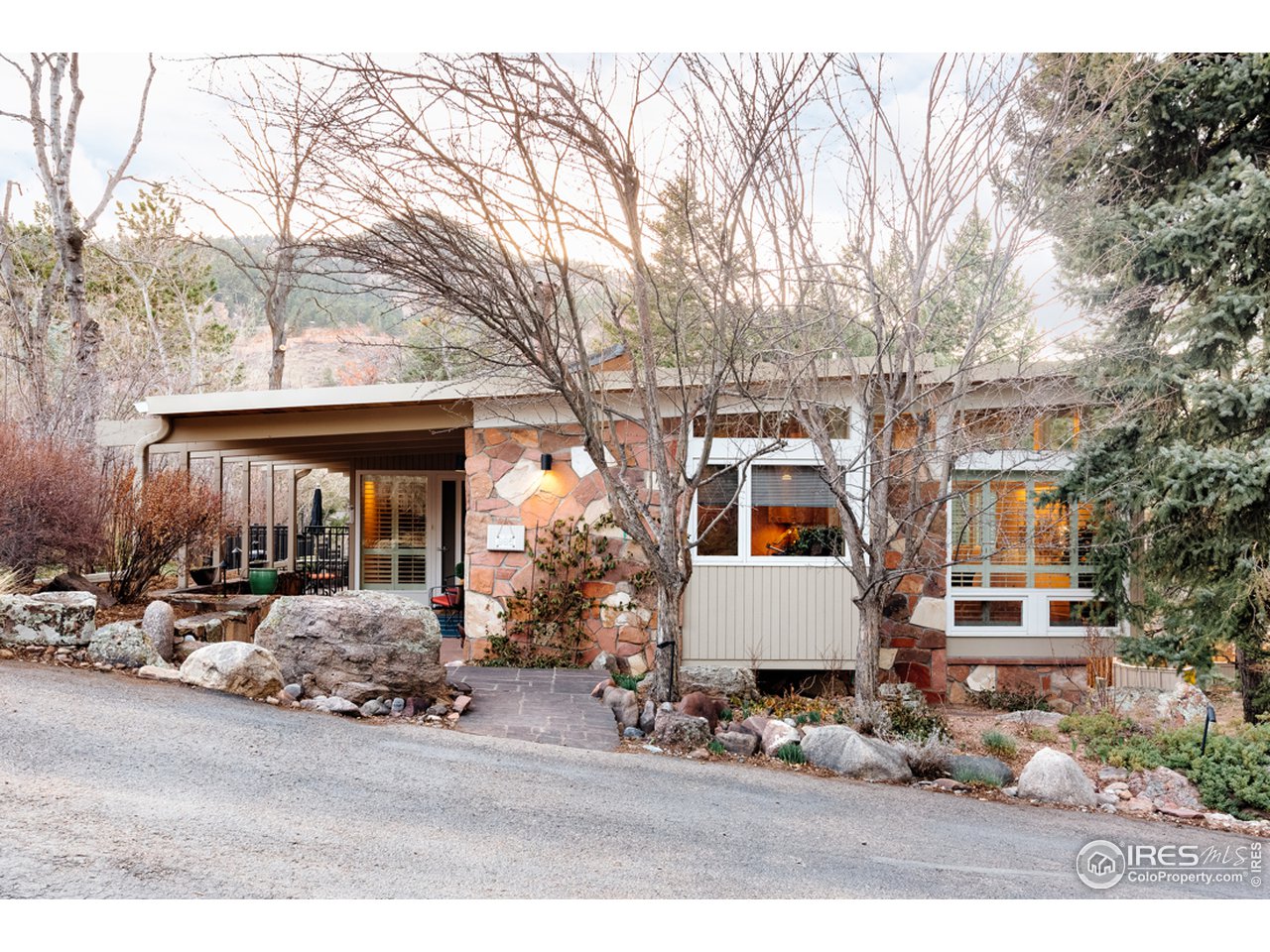 985 7th Street Boulder, CO 80302 - Photo 17 of 39 front view of house with a patio