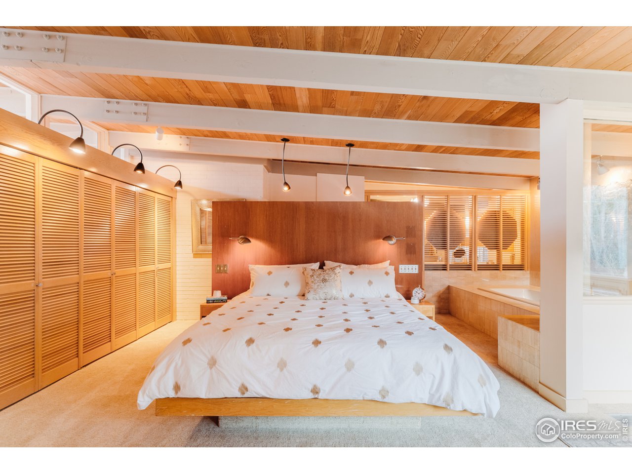 985 7th Street Boulder, CO 80302 - Photo 19 of 39 a bedroom with a bed and a night stand