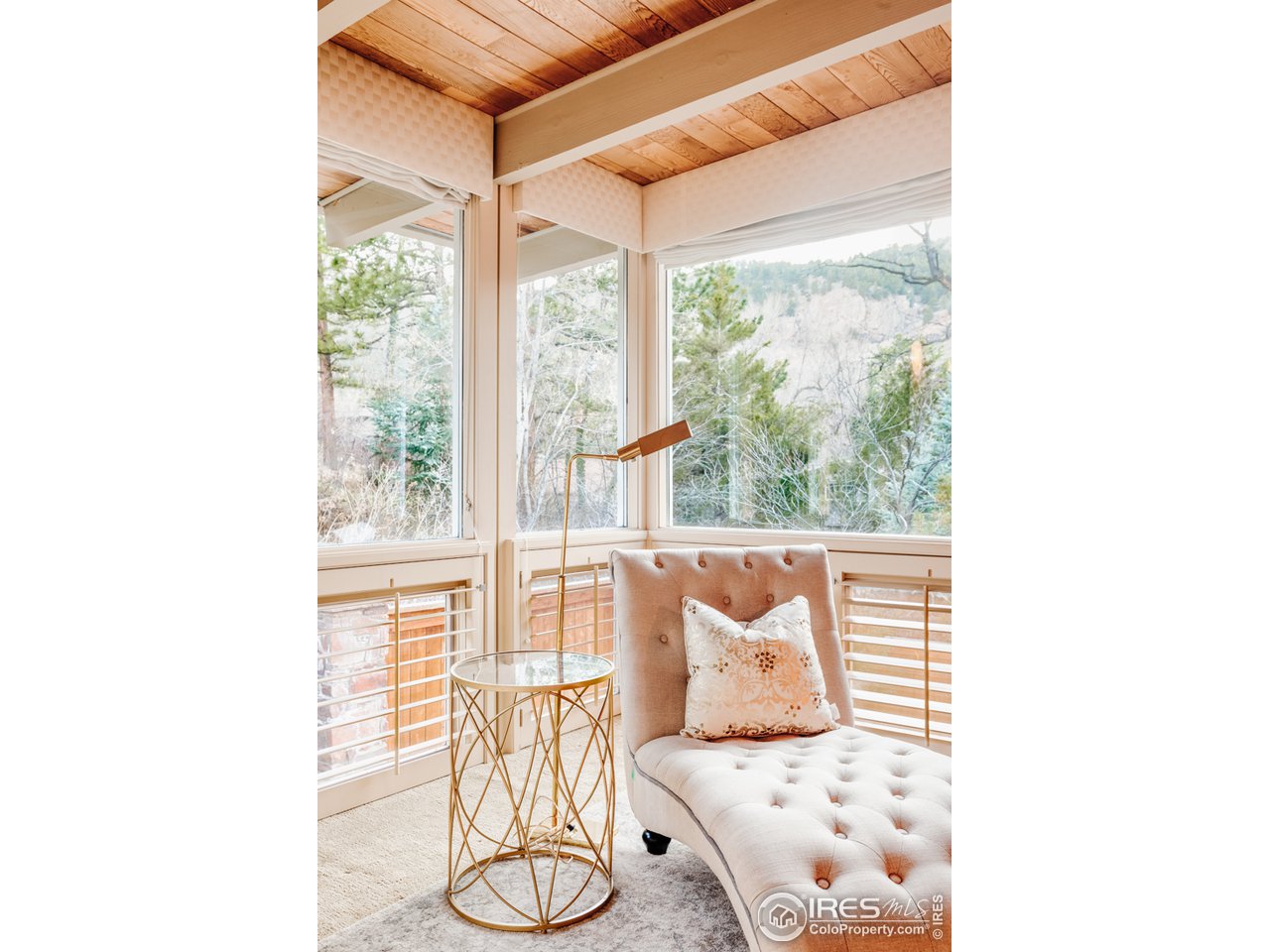 985 7th Street Boulder, CO 80302 - Photo 21 of 39 a living room with couch and a window