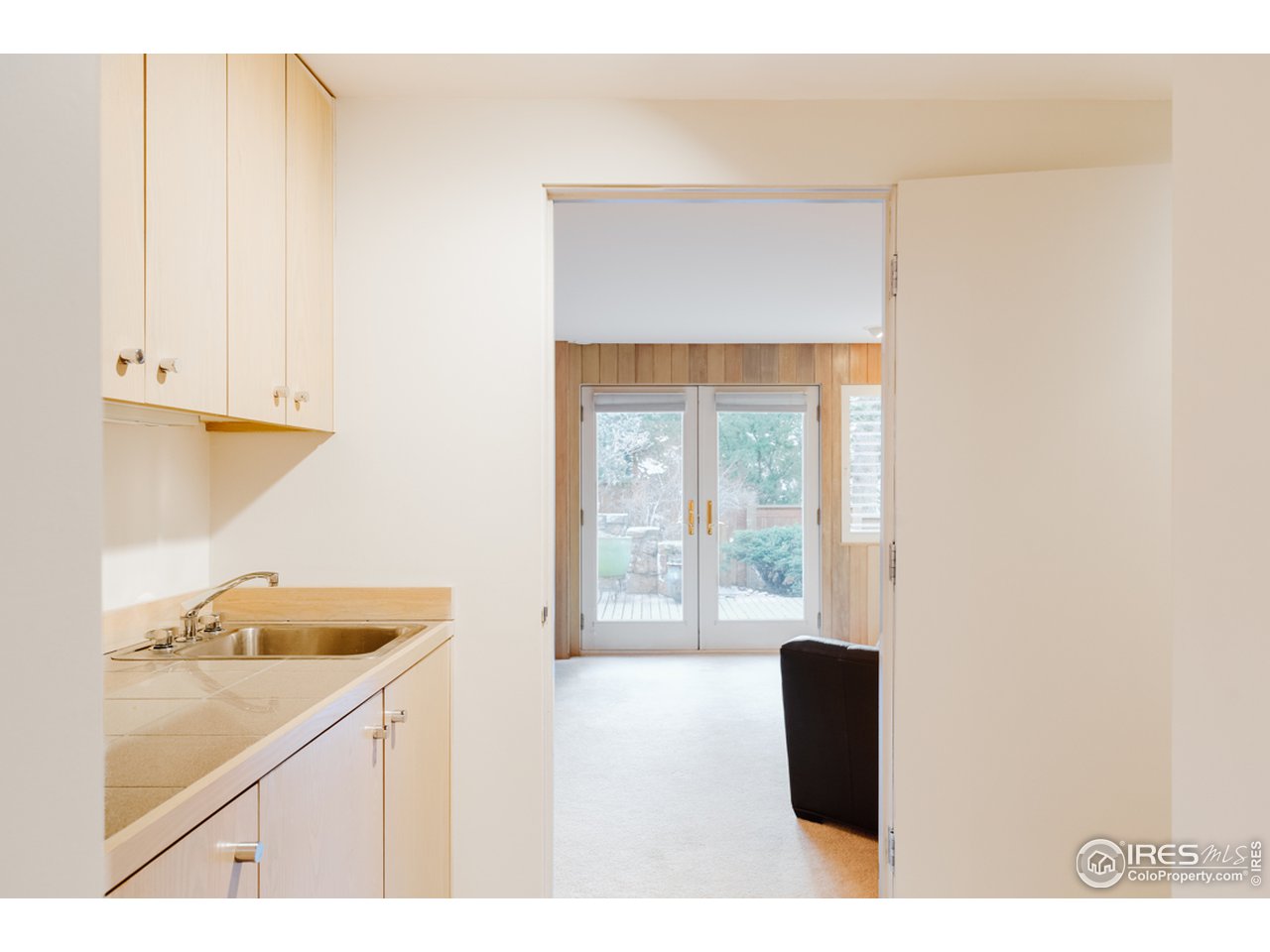 985 7th Street Boulder, CO 80302 - Photo 32 of 39 a bathroom with a sink and a window
