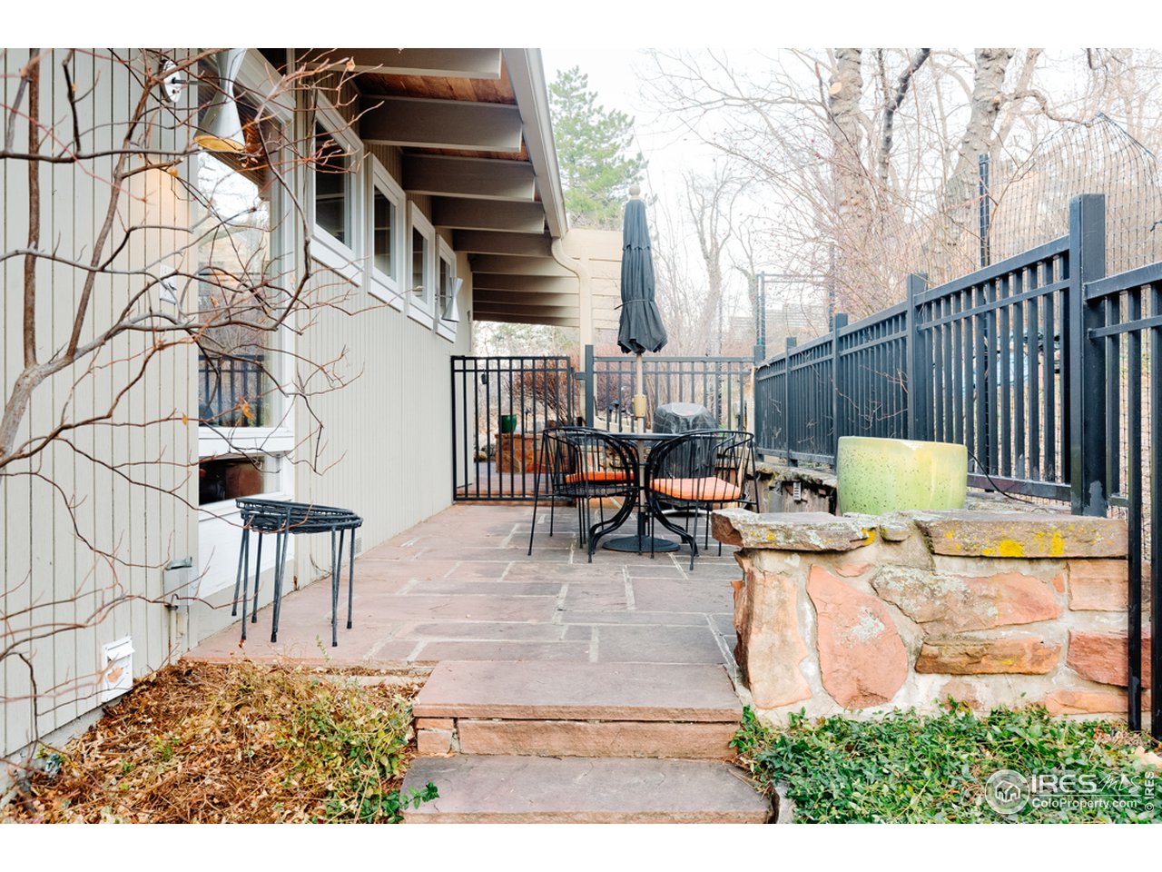 985 7th Street Boulder, CO 80302 - Photo 34 of 39 a balcony with chairs and a table