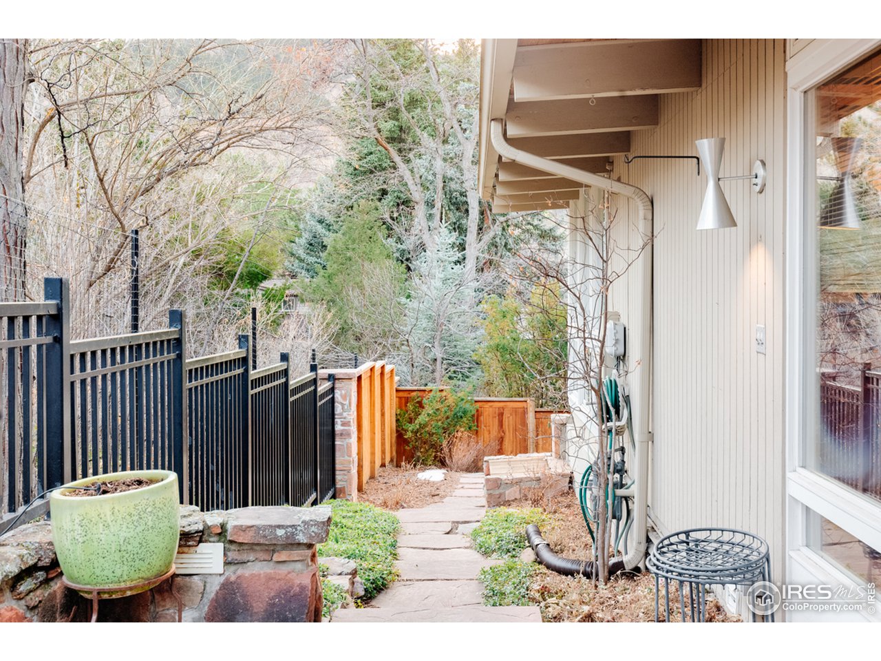 985 7th Street Boulder, CO 80302 - Photo 39 of 39 a view of a chair and table in the patio