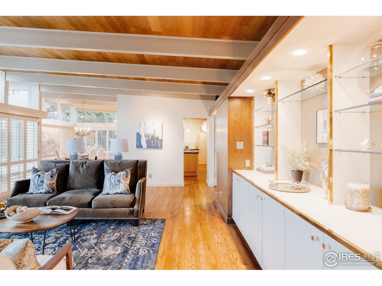985 7th Street Boulder, CO 80302 - Photo 7 of 39 a living room with furniture and a large window