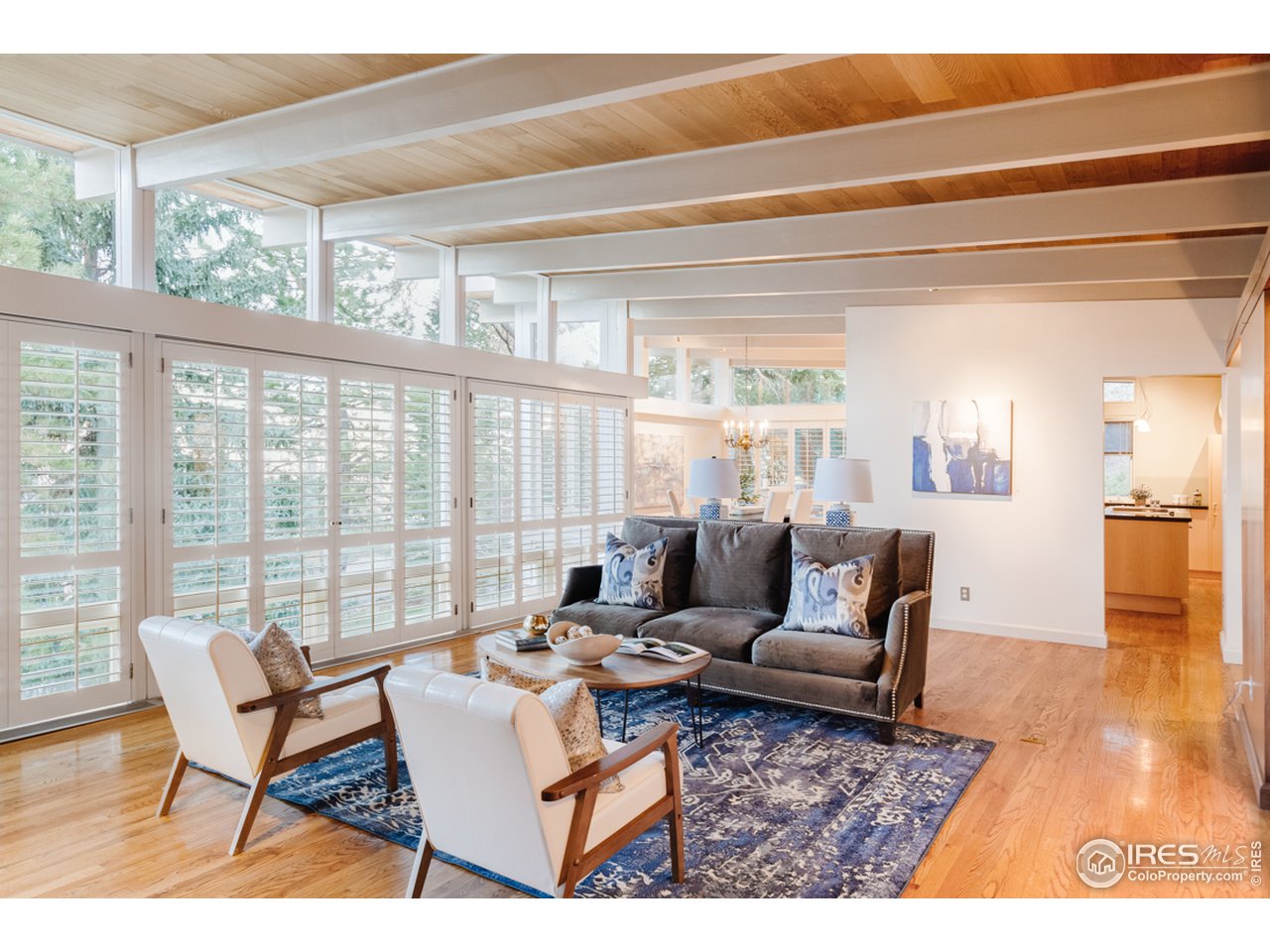 985 7th Street Boulder, CO 80302 - Photo 8 of 39 a living room with furniture and a large window