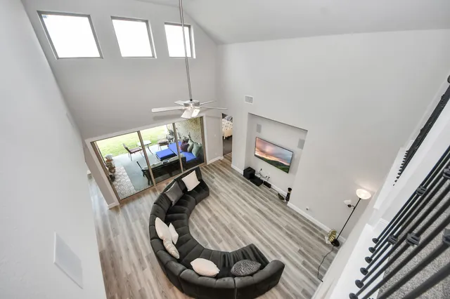 a view of a living room and dining room