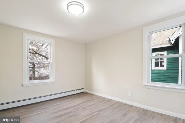 an empty room with windows