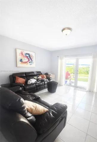 $335,000 | 13715 Kendale Lakes Circle, Unit A116, Miami, FL 33183