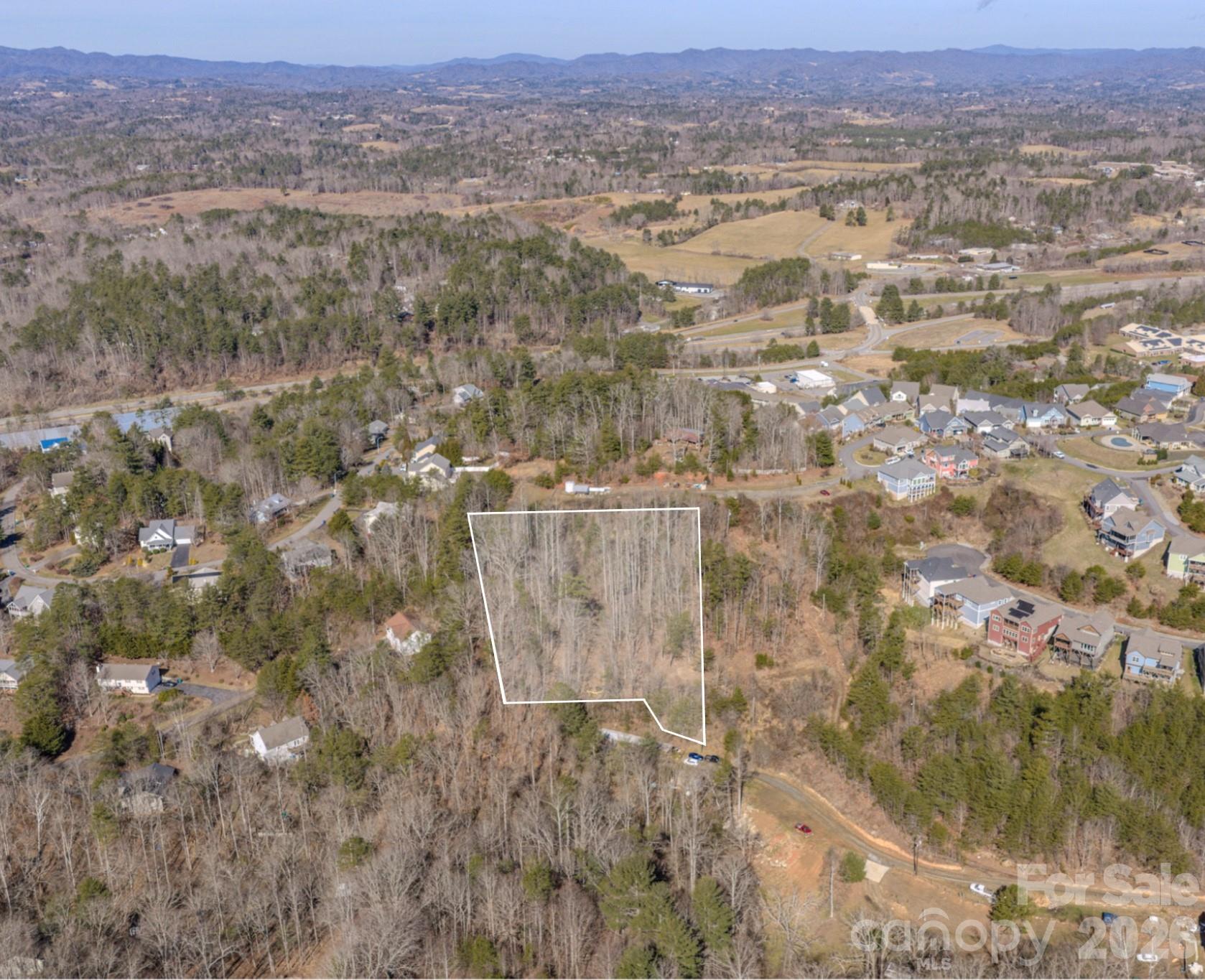 99999 Ralph Lunsford Road, Unit LOT 2 Weaverville, NC 28787 - Photo 3 of 13 a view of city and mountain view