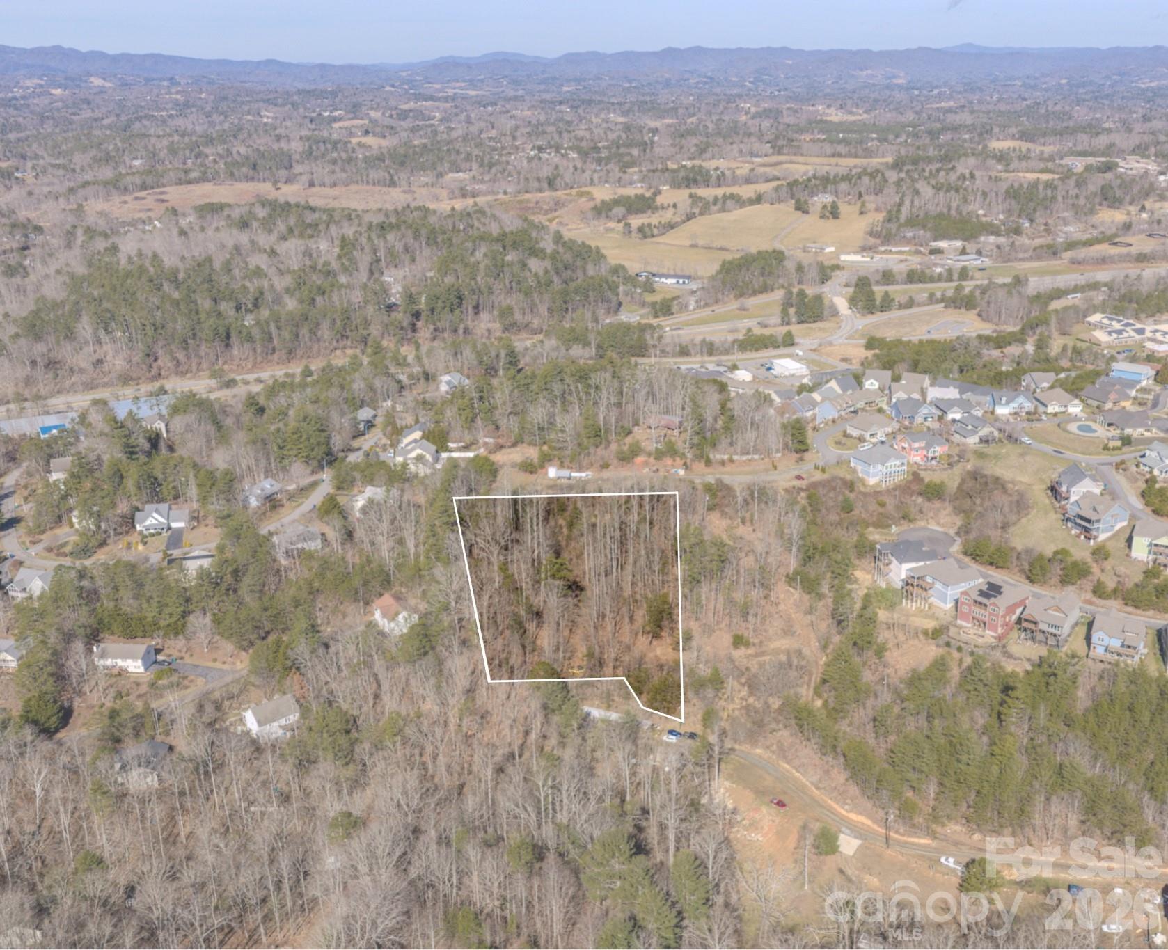99999 Ralph Lunsford Road, Unit LOT 2 Weaverville, NC 28787 - Photo 4 of 13 a view of city and mountain