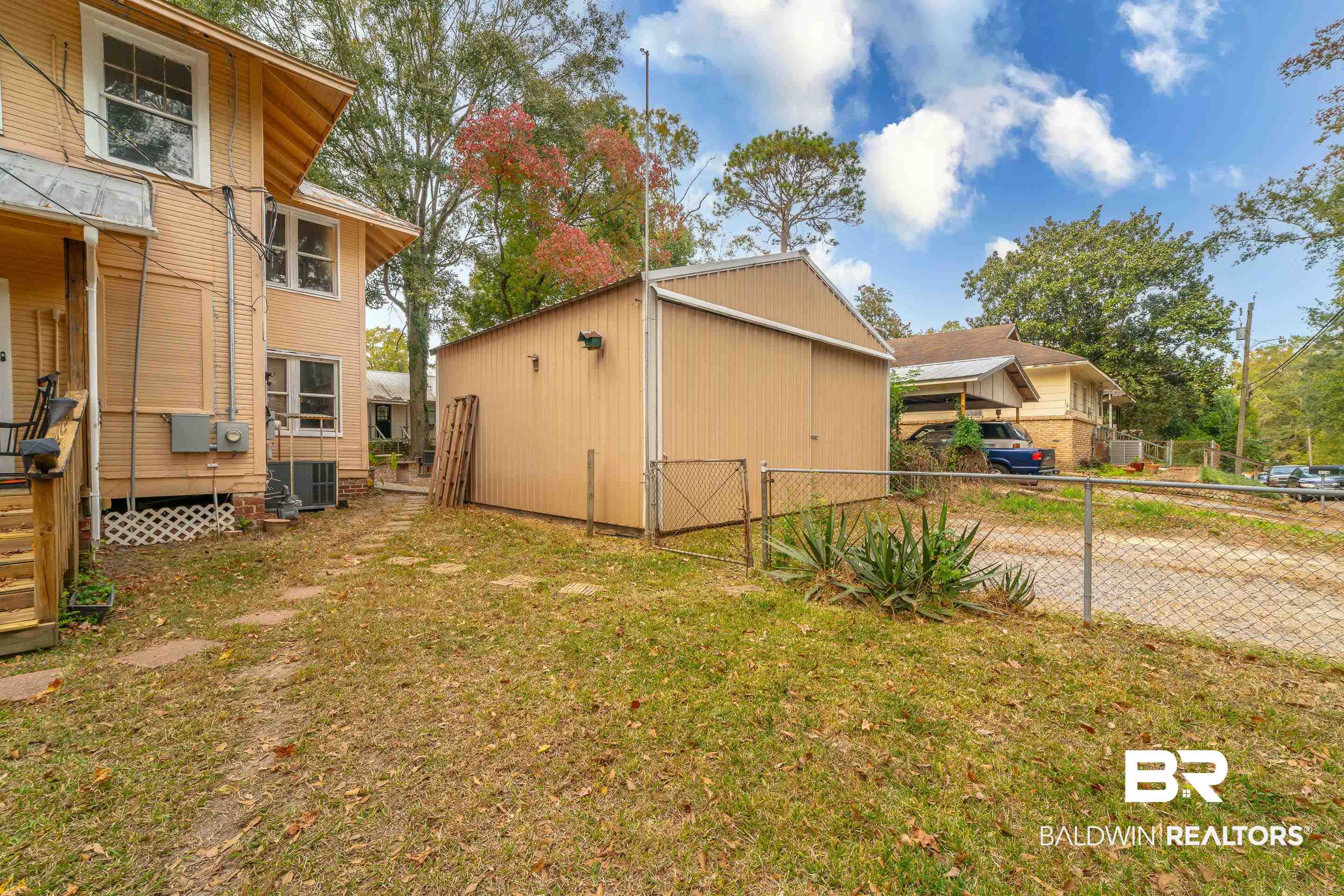 312 1st Street Mobile, AL 36611 - Photo 25 of 29 View of yard featuring central AC