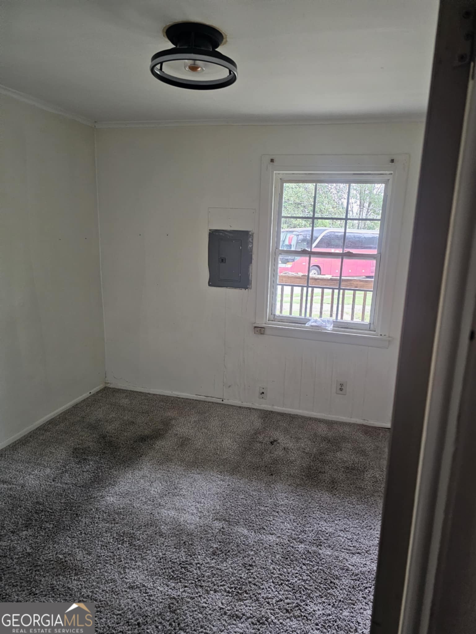 284 Newnan Street Franklin, GA 30217 - Photo 4 of 7 an empty room with a window