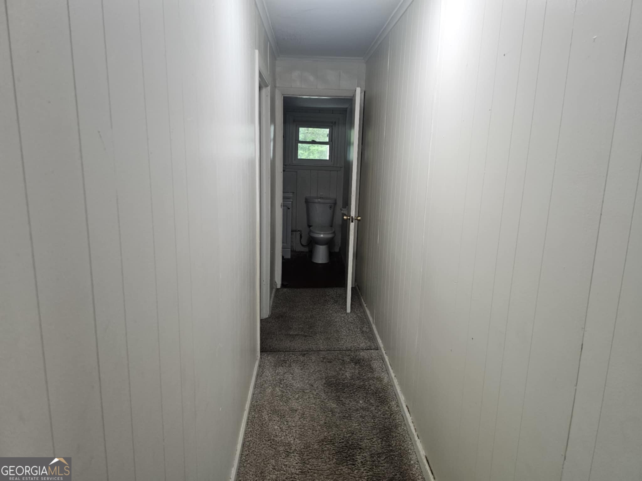 284 Newnan Street Franklin, GA 30217 - Photo 5 of 7 a view of a hallway with wooden floor