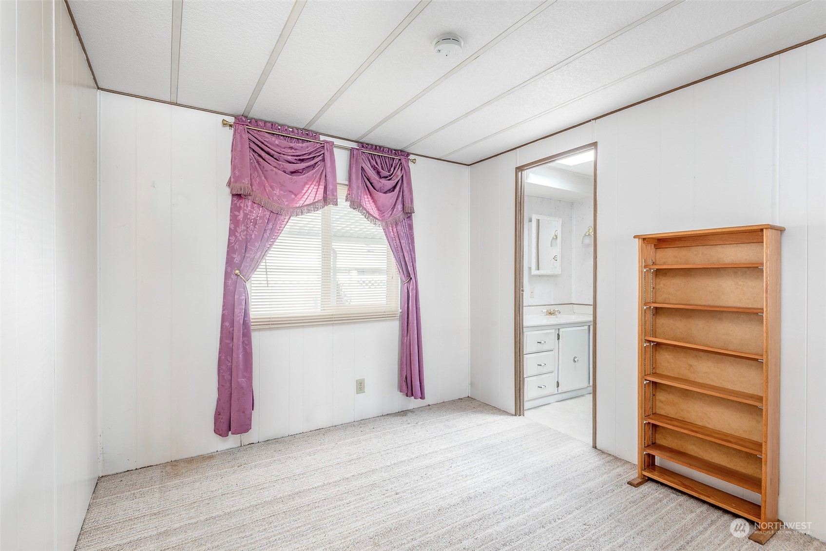 201 Union Avenue Southeast, Unit 99 Renton, WA 98059 - Photo 14 of 30 a view of a room with cabinet and a window
