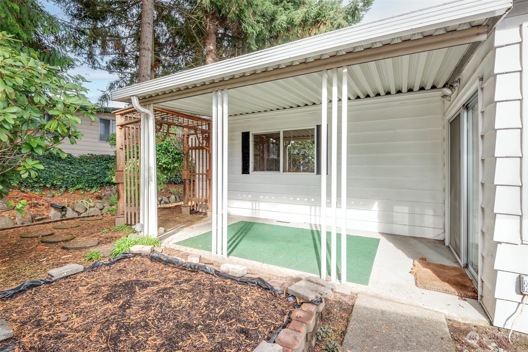 201 Union Avenue Southeast, Unit 99 Renton, WA 98059 - Photo 20 of 30 a house view with a outdoor space