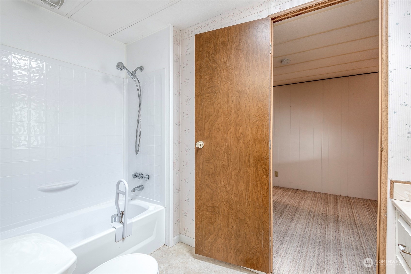 201 Union Avenue Southeast, Unit 99 Renton, WA 98059 - Photo 7 of 30 a bathroom with a sink a toilet and shower