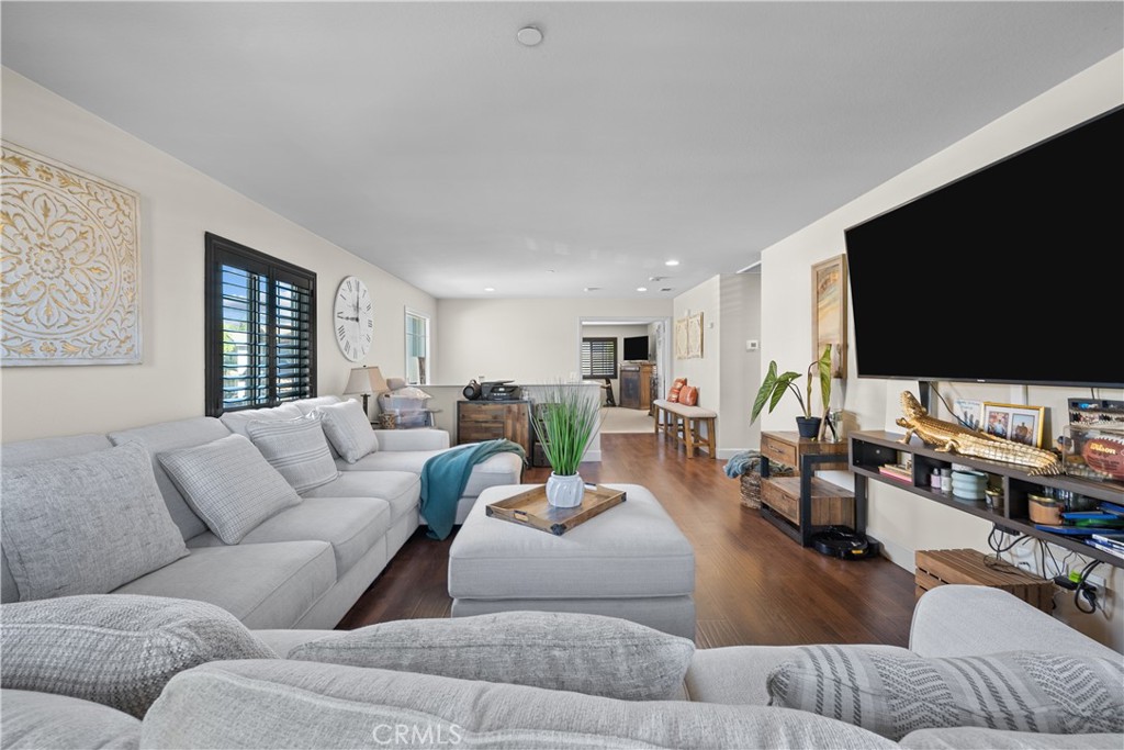 7925 Hemingway Court Fontana, CA 92336 - Photo 12 of 30 a living room with furniture and a flat screen tv