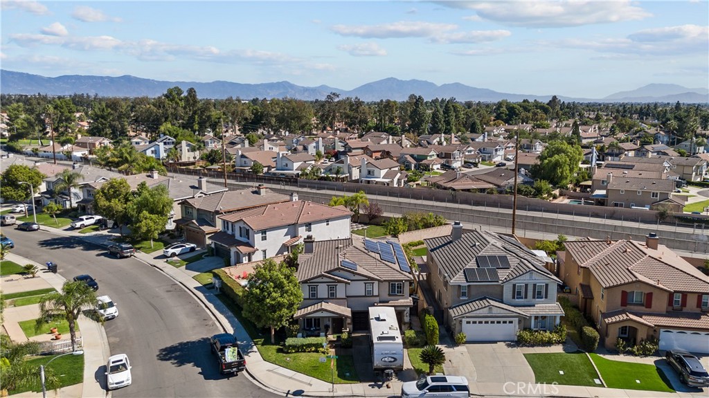 7925 Hemingway Court Fontana, CA 92336 - Photo 28 of 30 an aerial view of residential houses with city view