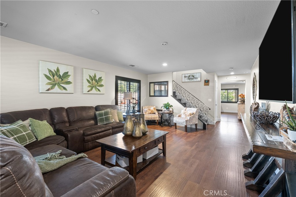 7925 Hemingway Court Fontana, CA 92336 - Photo 5 of 30 a living room with furniture or couch and a flat screen tv