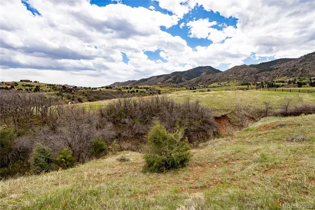 a view of lake with mountain