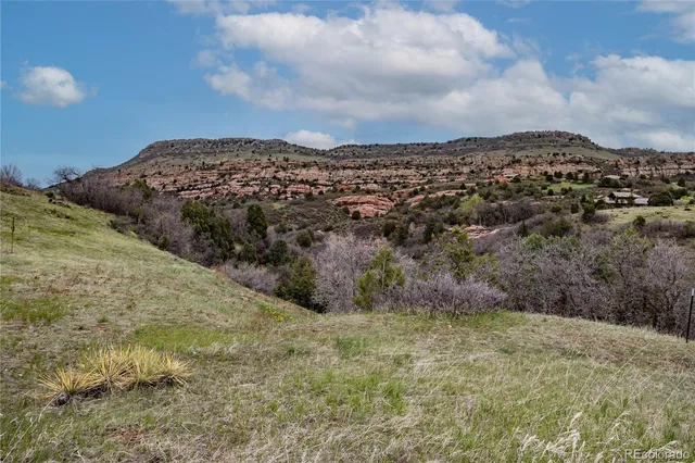 a view of mountain with lake