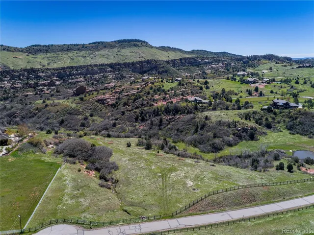 a view of a city with mountains in the background