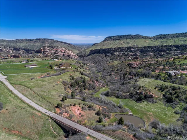 a view of a city with mountains in the background