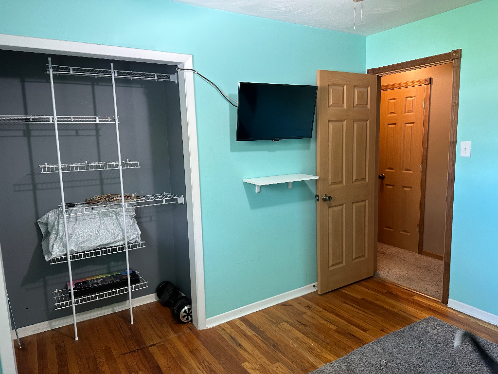 204 Rayjon Drive Oreana, IL 62554 - Photo 16 of 25 a room with wooden floor and closet