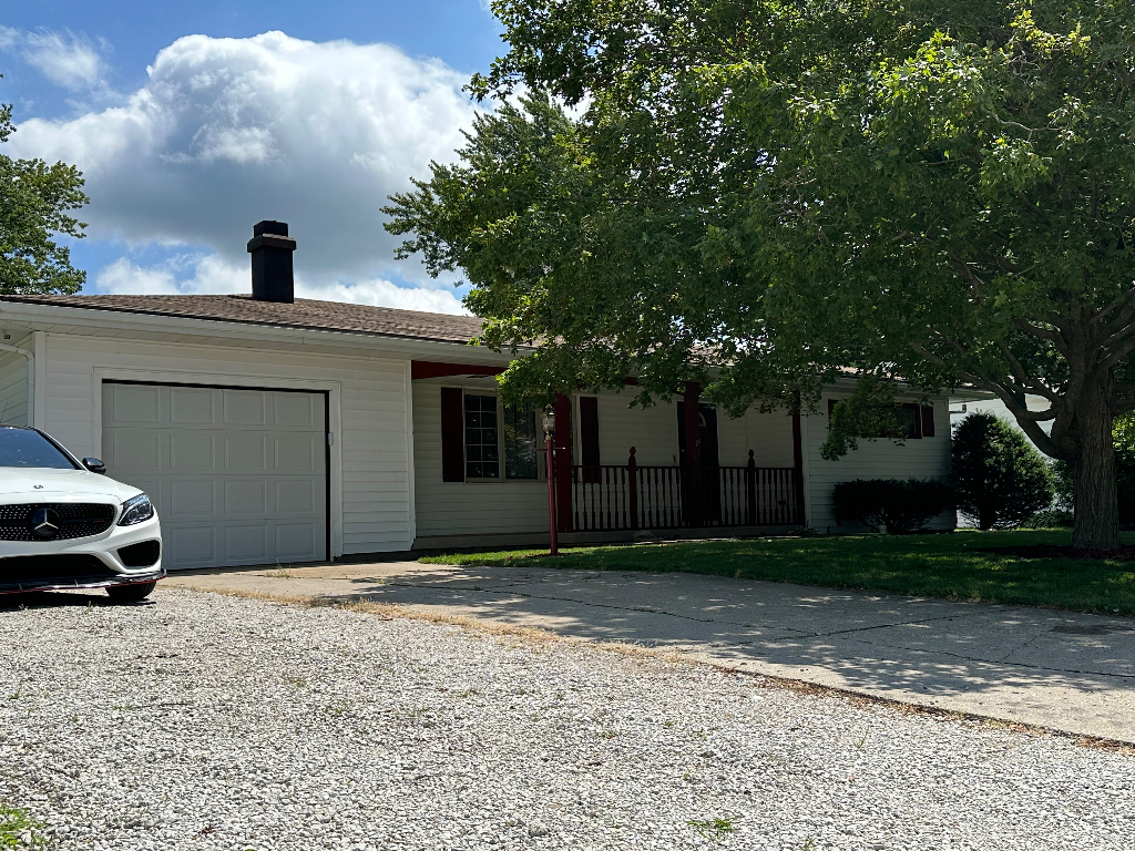 204 Rayjon Drive Oreana, IL 62554 - Photo 2 of 25 a car parked in front of white house