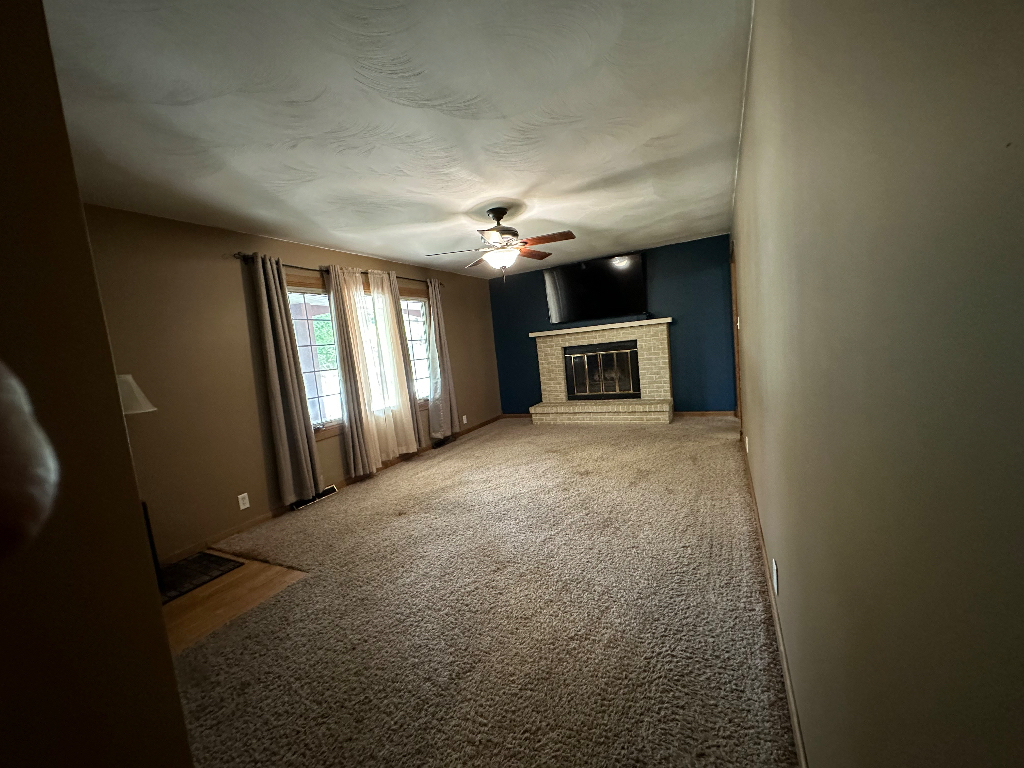 204 Rayjon Drive Oreana, IL 62554 - Photo 5 of 25 wooden floor in an empty room with a window