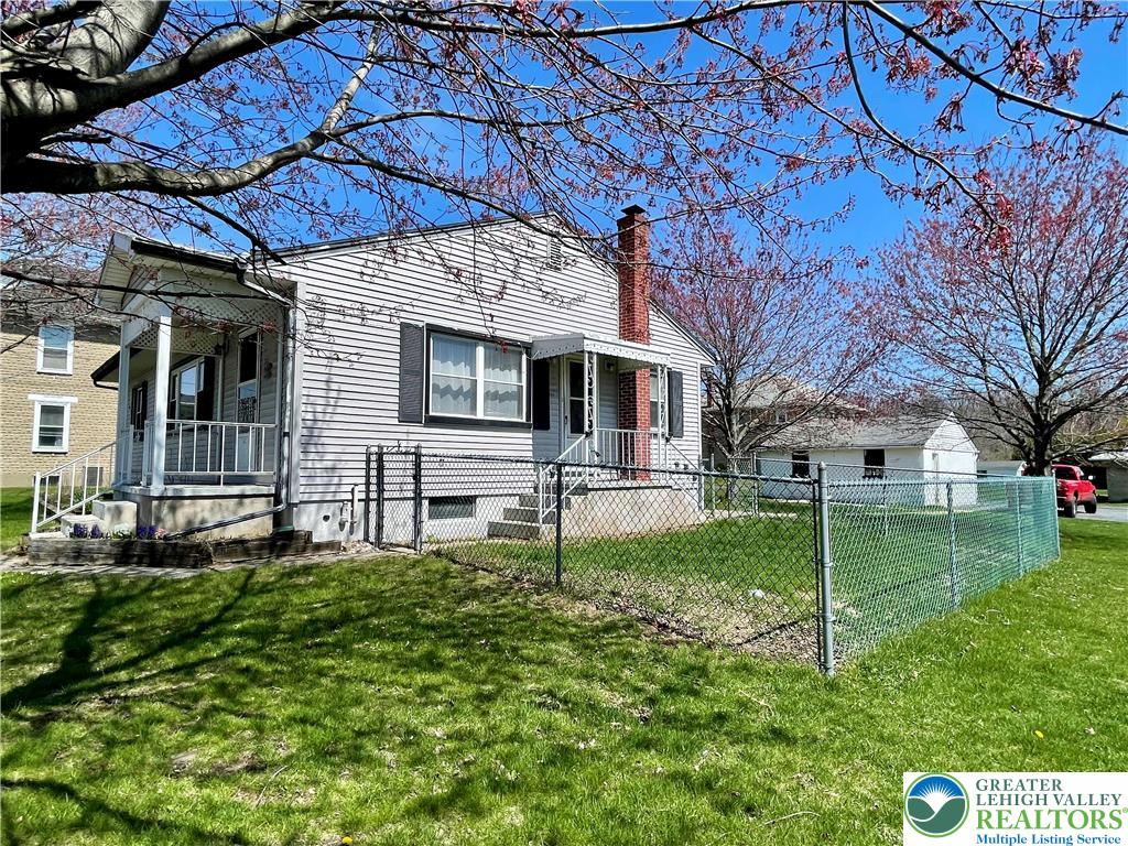 283 Broad Street Bath, PA 18014 - Photo 5 of 36 a house view with a sitting space and garden