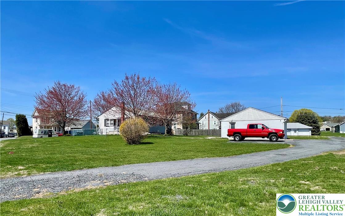 283 Broad Street Bath, PA 18014 - Photo 7 of 36 a view of yard with cars parked in front of house