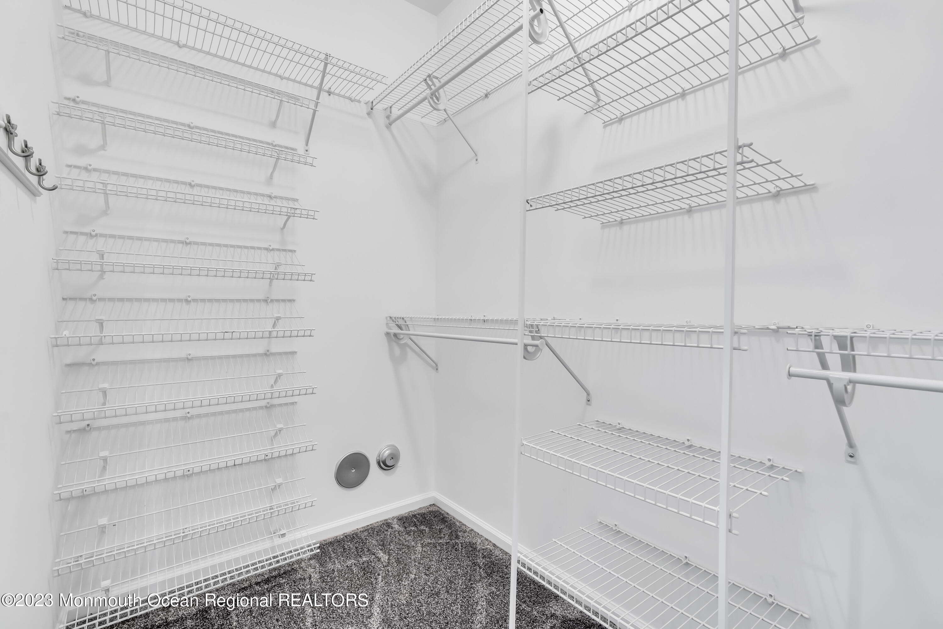 694 St Andrews Place Manalapan, NJ 07726 - Photo 11 of 21 a view of walk in closet