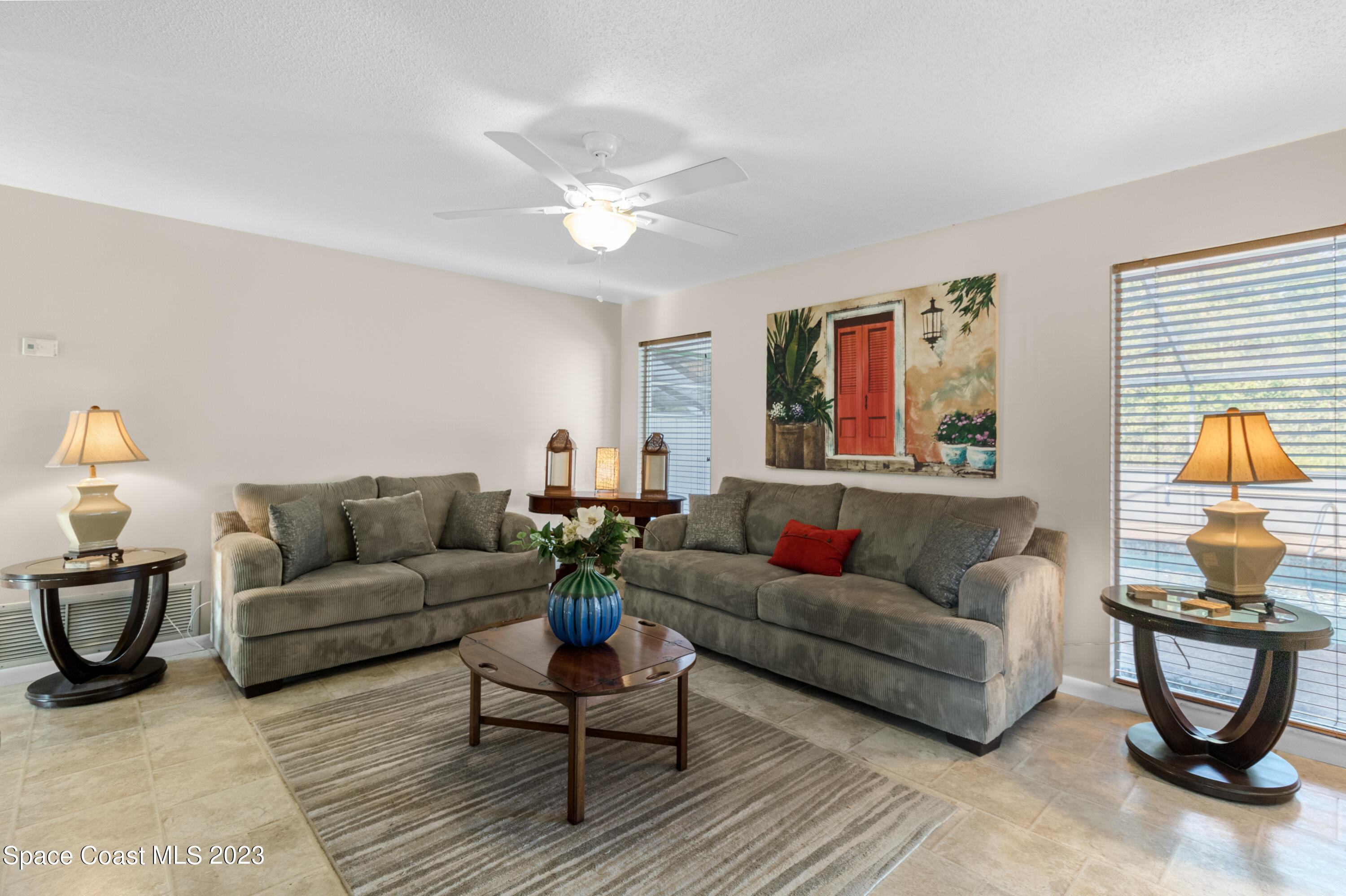 1113 Cromey Road Northeast Palm Bay, FL 32905 - Photo 10 of 46 living room view fron breakfast area