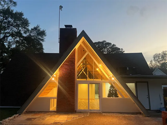 a view of swimming pool with seating space