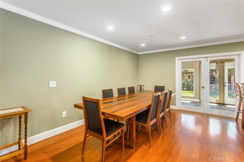 35893 Cornell Drive Yucaipa, CA 92399 - Photo 11 of 39 a view of a dining room with furniture and wooden floor