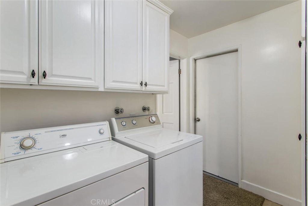 35893 Cornell Drive Yucaipa, CA 92399 - Photo 18 of 39 a view of storage and utility room with washer and dryer
