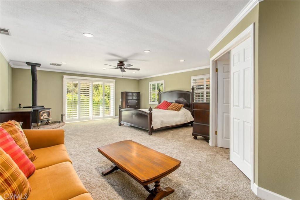 35893 Cornell Drive Yucaipa, CA 92399 - Photo 19 of 39 a living room with furniture and a window