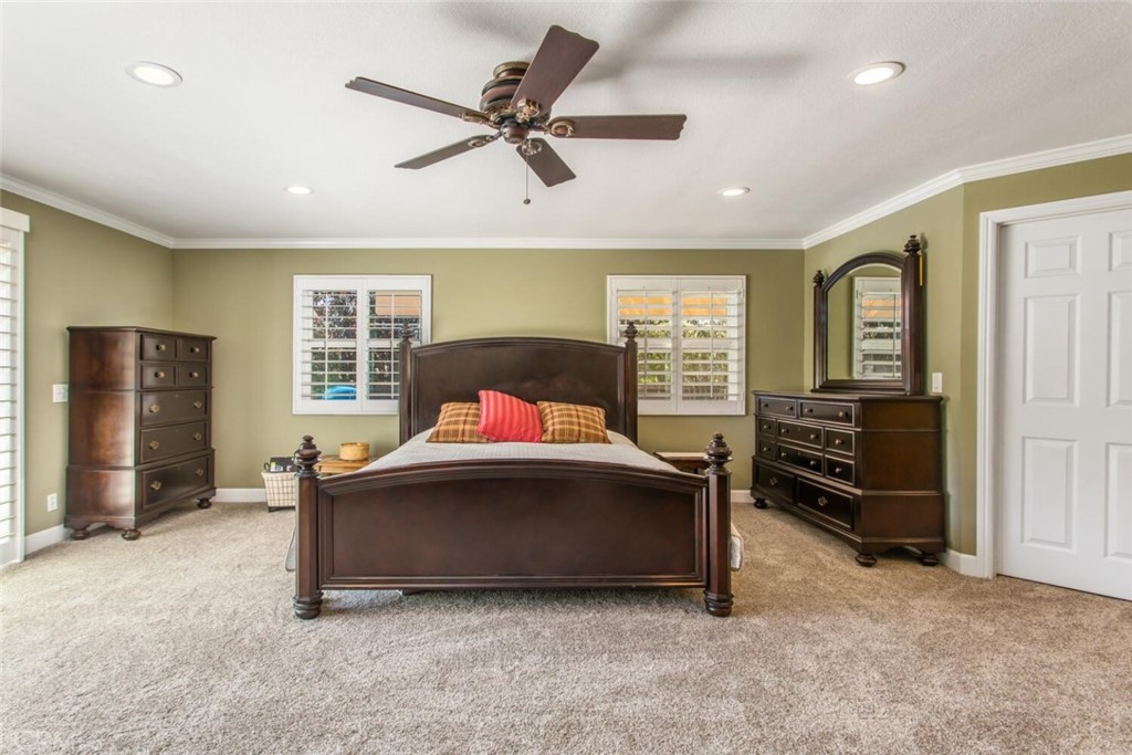 35893 Cornell Drive Yucaipa, CA 92399 - Photo 20 of 39 a living room with a bed furniture and a window