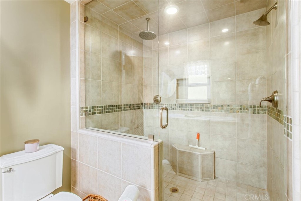 35893 Cornell Drive Yucaipa, CA 92399 - Photo 23 of 39 a bathroom with a sink mirror vanity and toilet