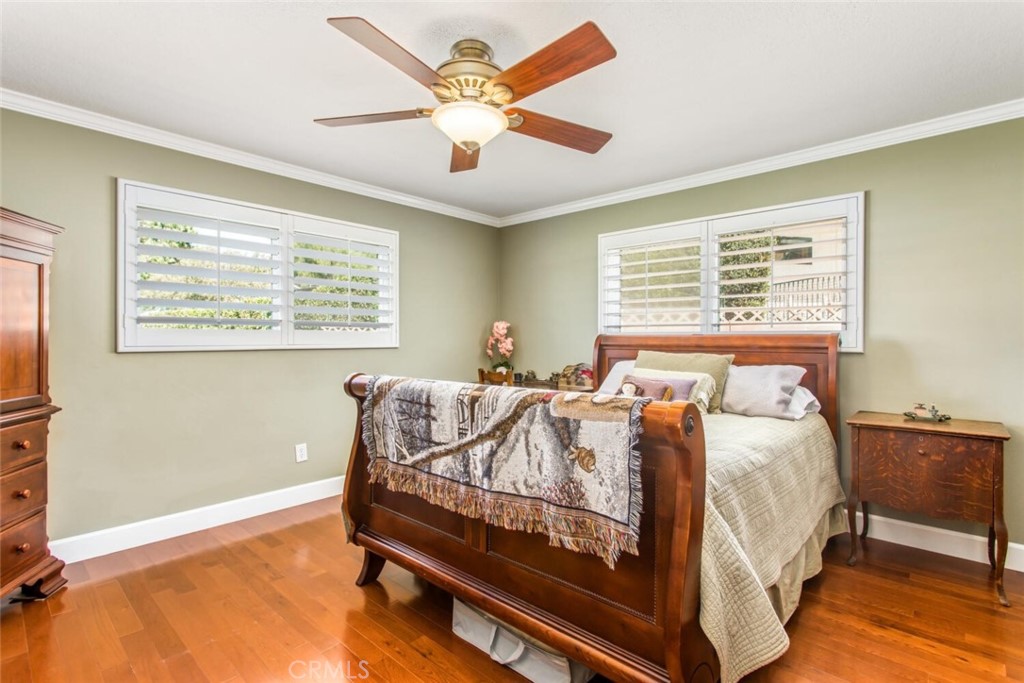 35893 Cornell Drive Yucaipa, CA 92399 - Photo 24 of 39 a bed sitting in a bedroom next to a window